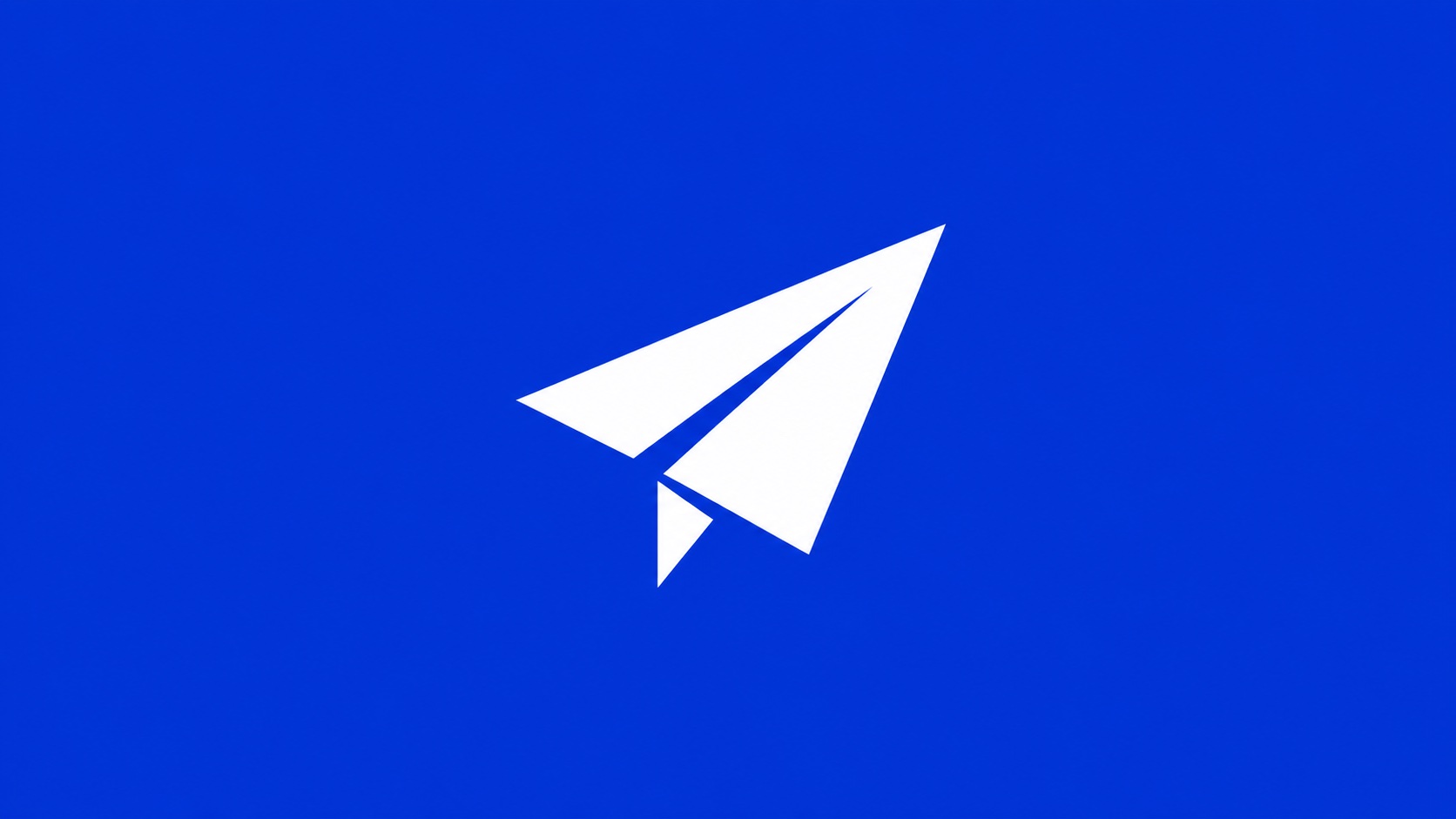 Image 1: a standalone white paper-plane symbol on cobalt